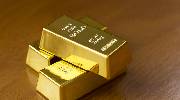 美联储加息预期降温 黄金价格窄幅拉低
